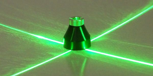 A green light is shown on the ground.
