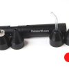 A set of black plastic plugs and a tube.