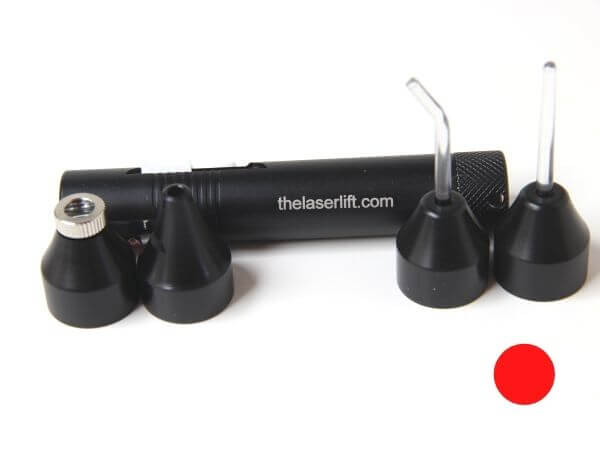 A set of black plastic plugs and a tube.