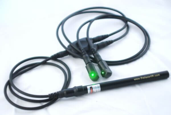 A pair of green lights are connected to two wires.